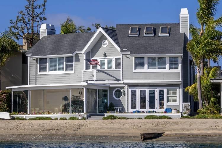 Exterior view of home with gray side panneling